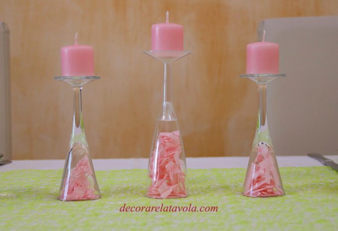 Tavola rosa centrotavola con candele